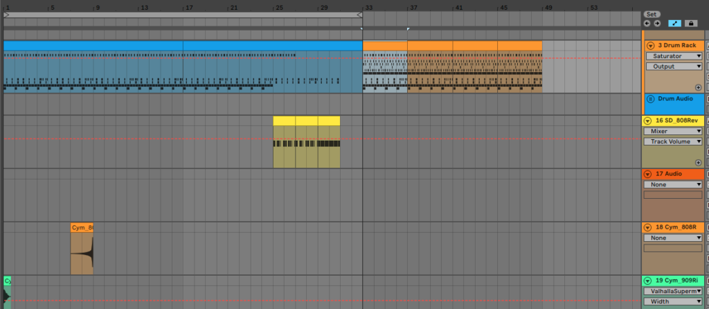 Ableton Live with drum rack and audio channels.